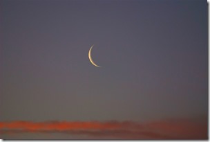 1200px-New_Moon_at_sunset_pd