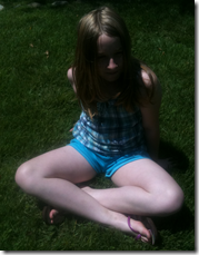 Photo of Girl Sitting Cross-legged