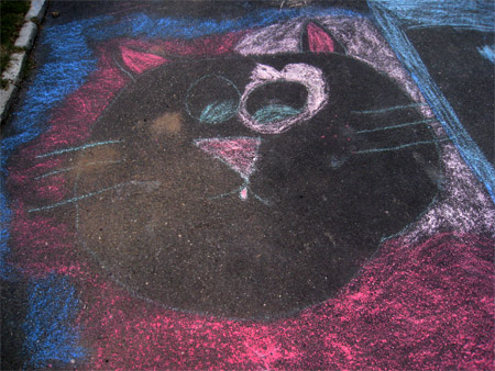 Photo of Chalk Drawings on Driveway