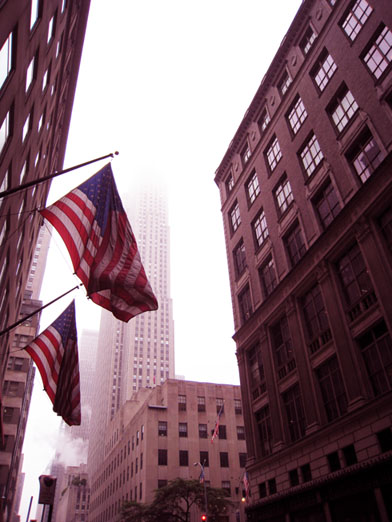 Photo of American Flags and The Empire State Building